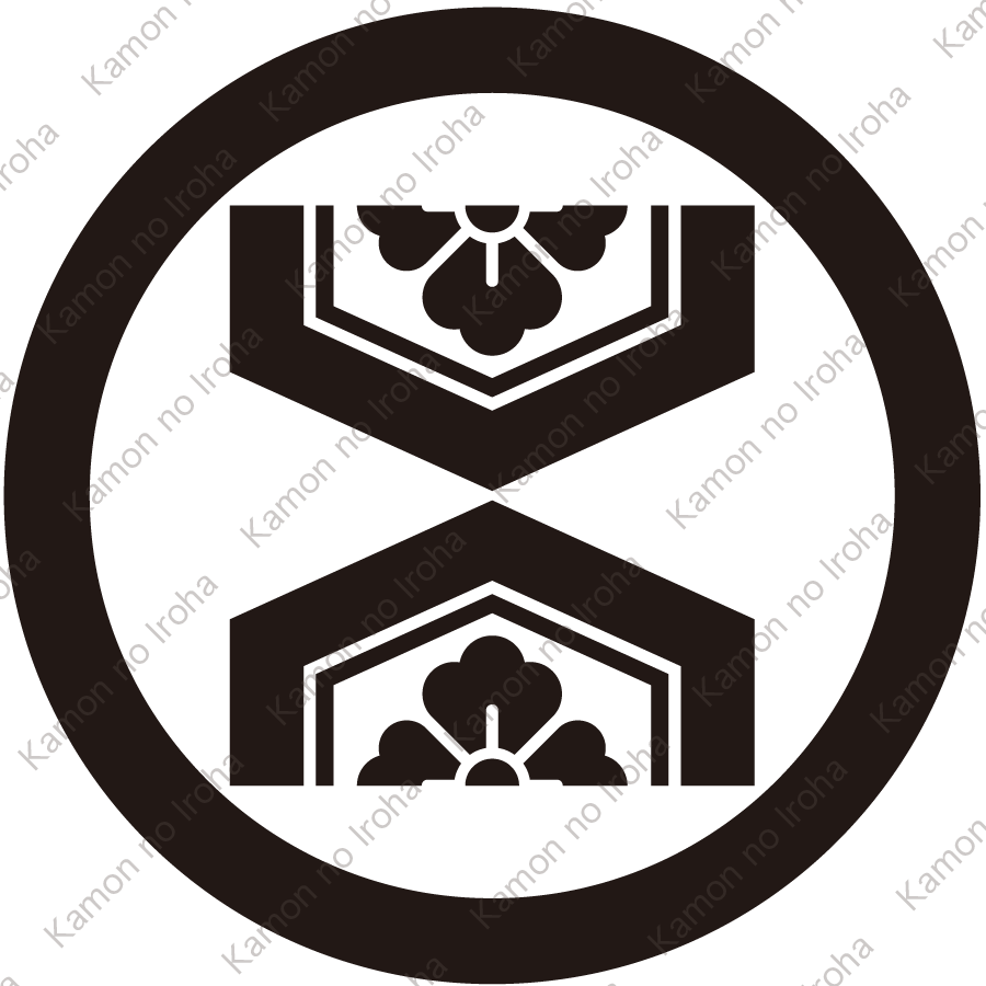 丸に対い割り亀甲に花角紋