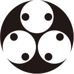 石持ち地抜き三つ分銅紋