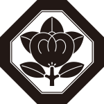 子持ち隅切り角に橘紋