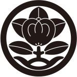 丸に台付き橘紋