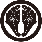 丸に抱き花杏葉紋