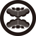 丸に頭合せ対い松紋