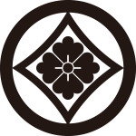 丸に反り角に花角紋