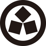 丸に隅合わせ三つ石紋