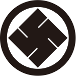 丸に隅立て右万字紋