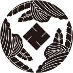 三つ割り五七桐に万字紋