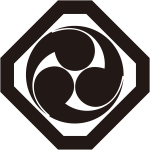 隅切り角に三つ巴紋