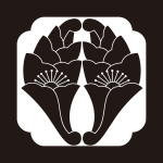 大夫角に抱き花杏葉紋